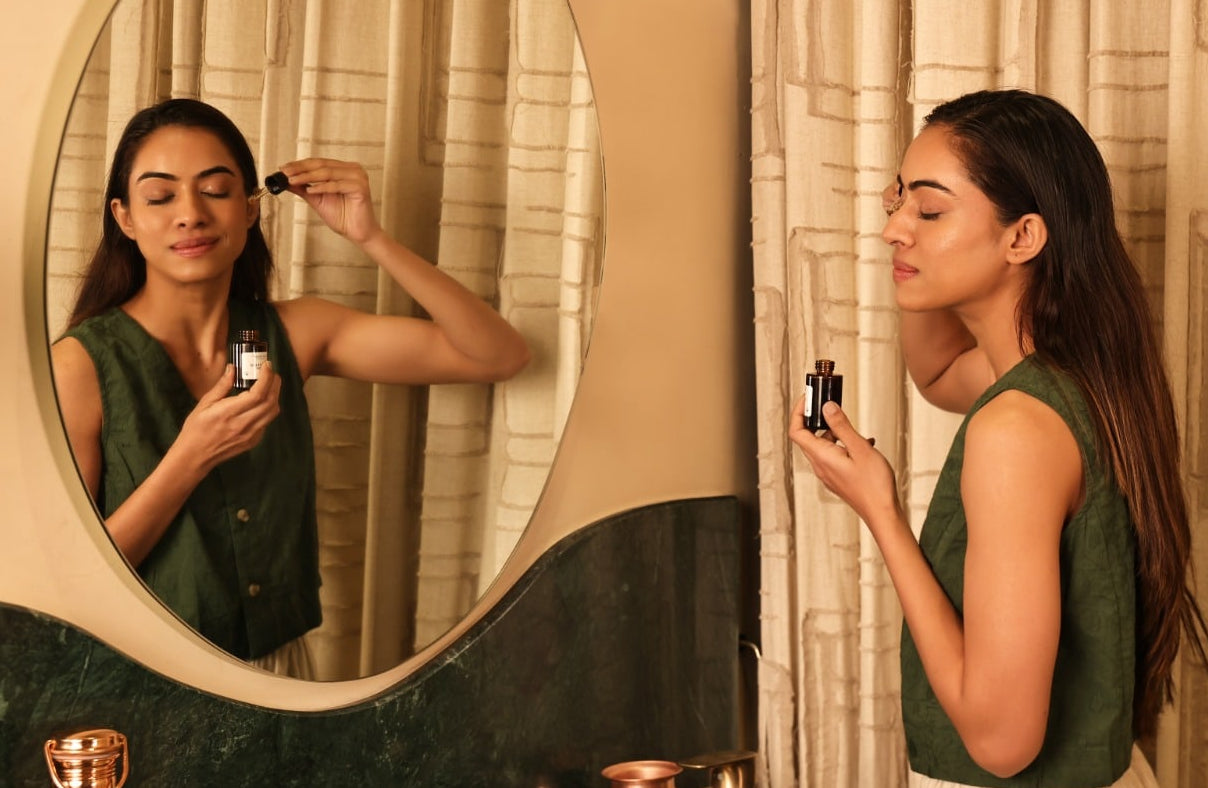 Art of Vedas Kumkumadi Serum Benefits - Woman Applying Ayurvedic Kumkumadi Face Oil for Glowing Skin